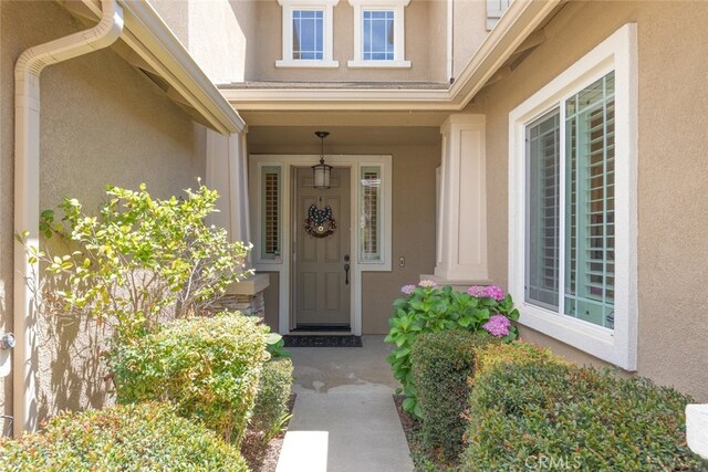 40433 Wgasa Pl, Temecula, CA 92591 - doorway to property with stucco siding