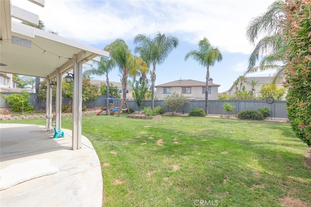 40433 Wgasa Pl, Temecula, CA 92591 - fenced backyard featuring a playground and a patio area