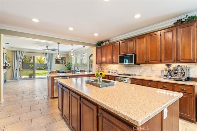 40433 Wgasa Pl, Temecula, CA 92591 - kitchen with appliances with stainless steel finishes, a peninsula, ornamental molding, a kitchen island, and decorative backsplash