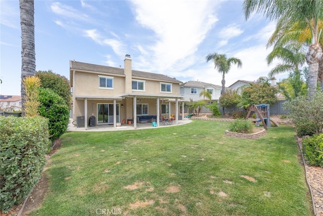 40433 Wgasa Pl, Temecula, CA 92591 - back of property featuring a patio, stucco siding, and a chimney