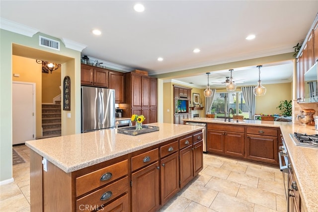 40433 Wgasa Pl, Temecula, CA 92591 - kitchen featuring appliances with stainless steel finishes, crown molding, recessed lighting, a kitchen island, and pendant lighting