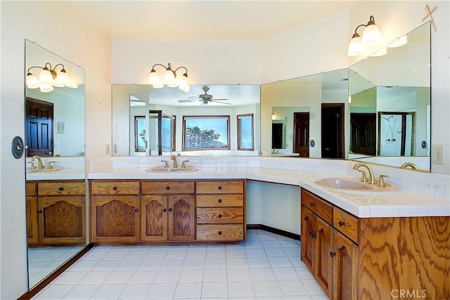6735 Calais Ct, Riverside, CA 92506 - bathroom featuring double vanity, ceiling fan, and tile patterned flooring