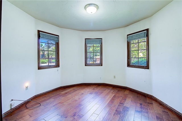 6735 Calais Ct, Riverside, CA 92506 - empty room featuring hardwood / wood-style floors and baseboards