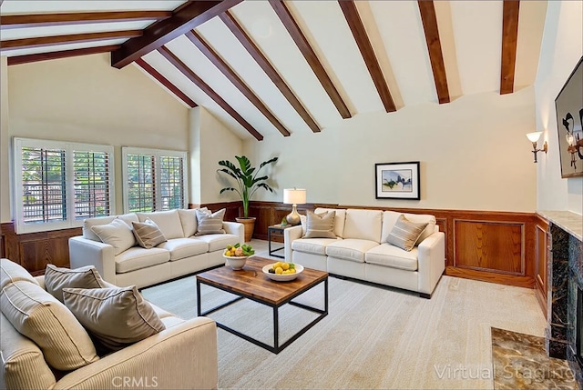 6735 Calais Ct, Riverside, CA 92506 - living room featuring a wainscoted wall, beamed ceiling, high vaulted ceiling, and light colored carpet