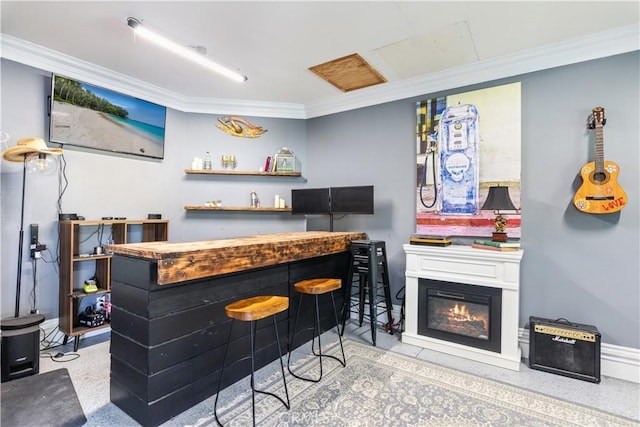 32244 Corte Coronado, Temecula, CA 92592 - indoor dry bar with speckle patterned floor, crown molding, and a glass covered fireplace