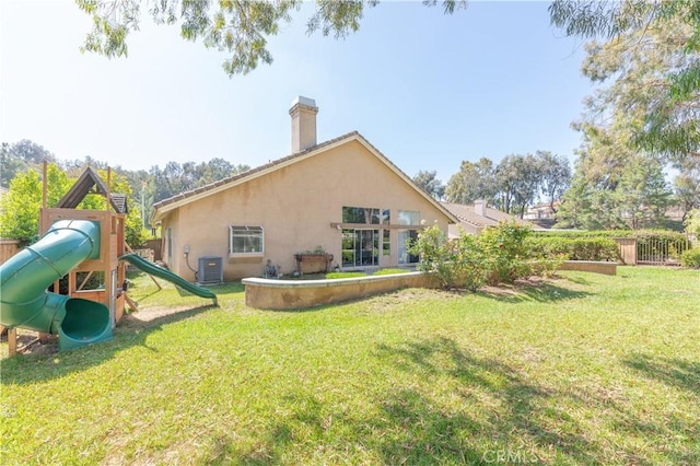 32244 Corte Coronado, Temecula, CA 92592 - back of house featuring stucco siding, a playground, and a chimney