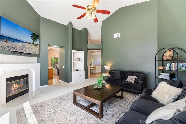 32244 Corte Coronado, Temecula, CA 92592 - living area featuring a ceiling fan, high vaulted ceiling, a glass covered fireplace, and built in features