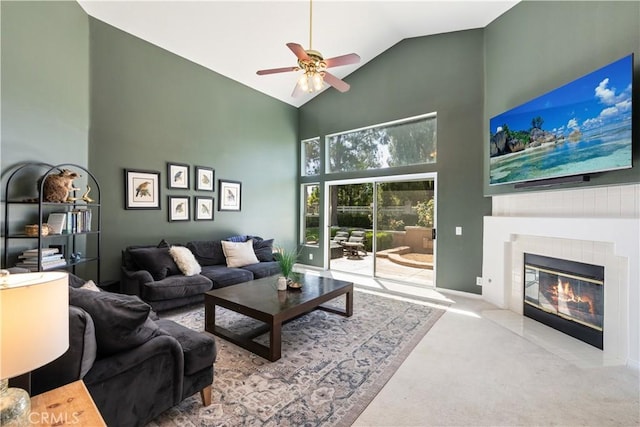 32244 Corte Coronado, Temecula, CA 92592 - living area with high vaulted ceiling, carpet floors, ceiling fan, and a tiled fireplace