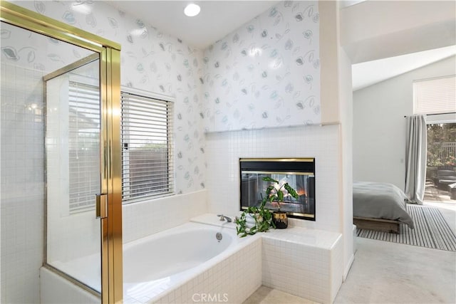 32244 Corte Coronado, Temecula, CA 92592 - bathroom with a garden tub, wallpapered walls, a shower with door, and a tile fireplace
