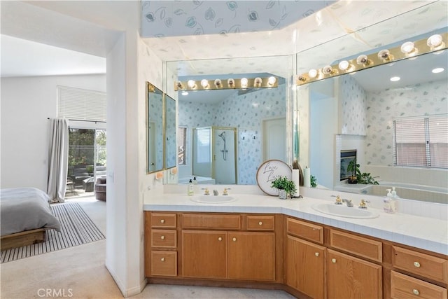 32244 Corte Coronado, Temecula, CA 92592 - bathroom with wallpapered walls, double vanity, and a shower stall