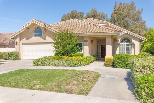32244 Corte Coronado, Temecula, CA 92592 - mediterranean / spanish house with an attached garage, stucco siding, driveway, a tile roof, and a front lawn