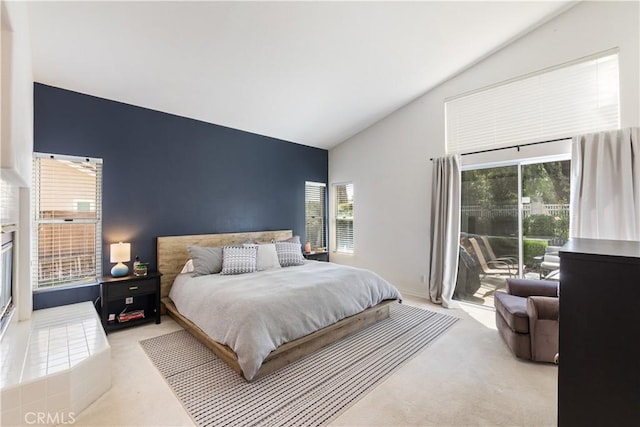 32244 Corte Coronado, Temecula, CA 92592 - bedroom featuring access to exterior, multiple windows, high vaulted ceiling, and light colored carpet