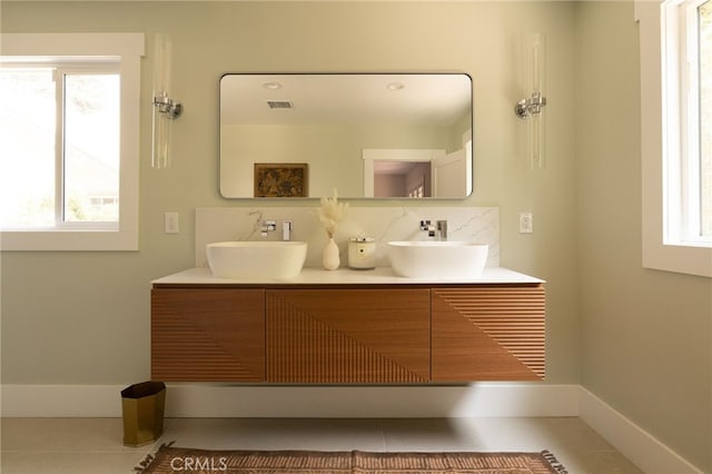 814 E Foothill Blvd, Monrovia, CA 91016 - full bathroom featuring healthy amount of natural light, double vanity, and tile patterned floors