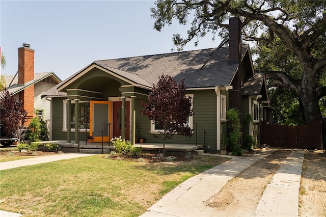 814 E Foothill Blvd, Monrovia, CA 91016 - view of front facade with covered porch, concrete driveway, and a shingled roof