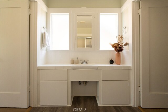 814 E Foothill Blvd, Monrovia, CA 91016 - bathroom with plenty of natural light, backsplash, wood finished floors, and vanity