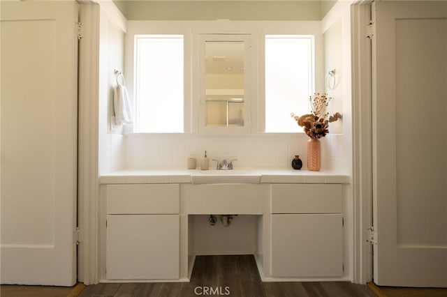 814 E Foothill Blvd, Monrovia, CA 91016 - bathroom featuring wood finished floors, tasteful backsplash, and vanity
