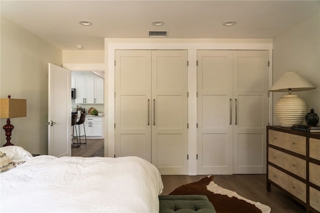 814 E Foothill Blvd, Monrovia, CA 91016 - bedroom with dark wood finished floors, multiple closets, and recessed lighting