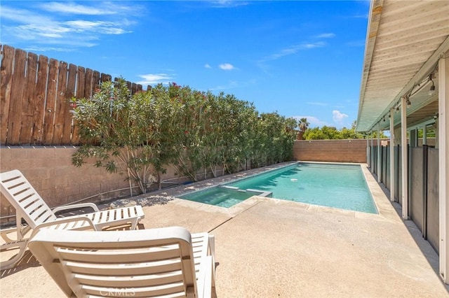 42915 Wisconsin Ave, Palm Desert, CA 92211 - view of pool with a patio area, a fenced backyard, and a pool with connected hot tub