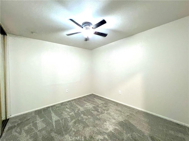 42915 Wisconsin Ave, Palm Desert, CA 92211 - spare room with a ceiling fan, carpet floors, and a textured ceiling