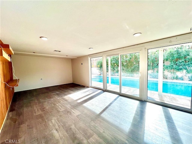 42915 Wisconsin Ave, Palm Desert, CA 92211 - unfurnished living room with wood finished floors