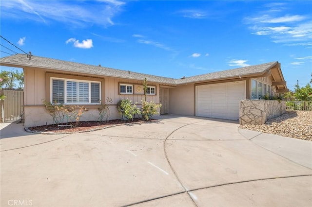 42915 Wisconsin Ave, Palm Desert, CA 92211 - ranch-style home with driveway and an attached garage