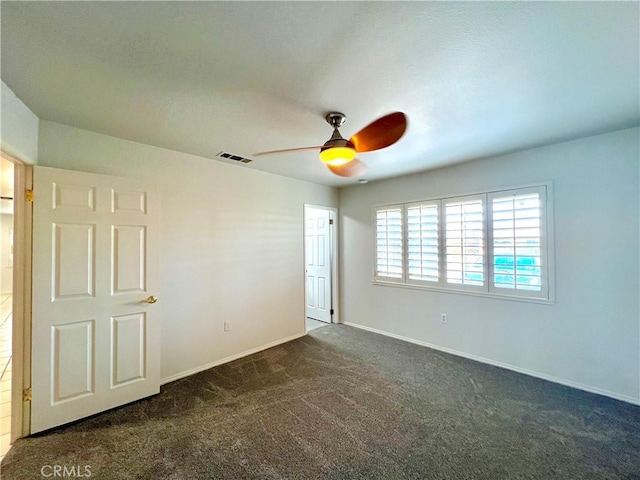 42915 Wisconsin Ave, Palm Desert, CA 92211 - unfurnished bedroom with carpet floors and a ceiling fan