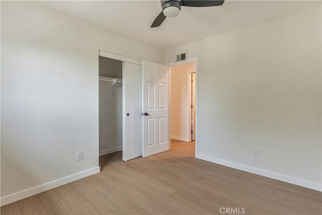 1640 235th St Unit D, Harbor City, CA 90710 - unfurnished bedroom featuring wood finished floors, a closet, and a ceiling fan