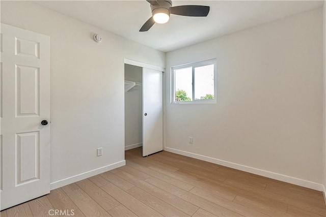 1640 235th St Unit D, Harbor City, CA 90710 - unfurnished bedroom with light wood finished floors, a closet, and ceiling fan