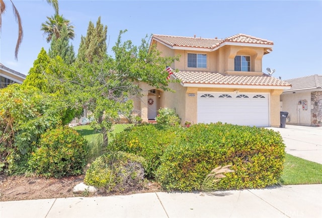 13100 Red Corral Dr, Corona, CA 92883 - view of front facade with stucco siding, a tile roof, concrete driveway, and an attached garage