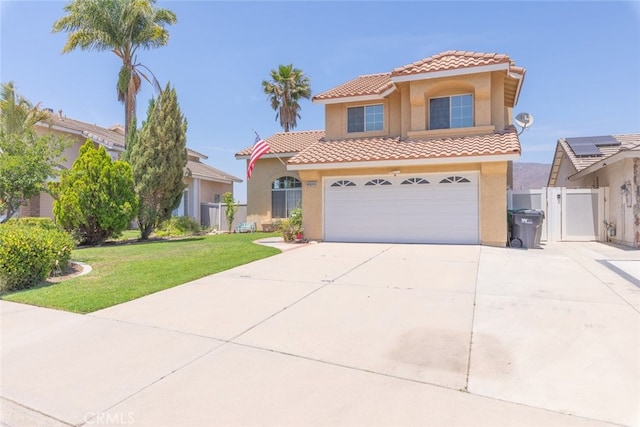13100 Red Corral Dr, Corona, CA 92883 - view of front of property featuring stucco siding, a tile roof, driveway, a garage, and a gate