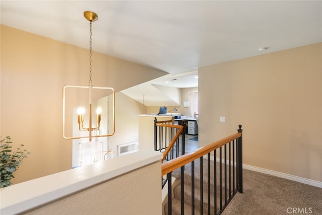 13100 Red Corral Dr, Corona, CA 92883 - hallway featuring carpet and a chandelier