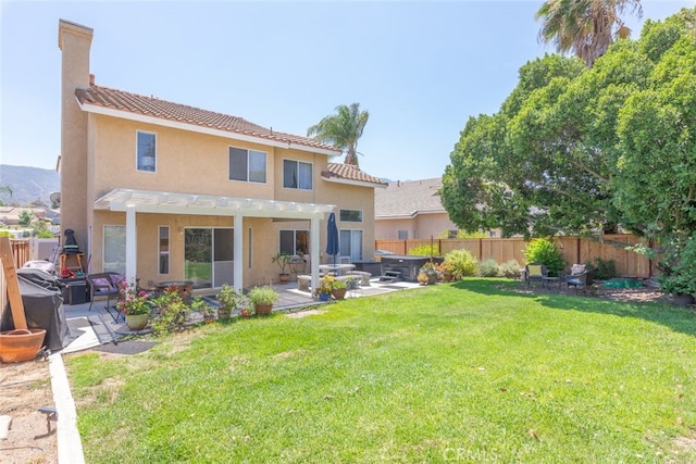 13100 Red Corral Dr, Corona, CA 92883 - rear view of house featuring a fenced backyard, stucco siding, a pergola, and a patio