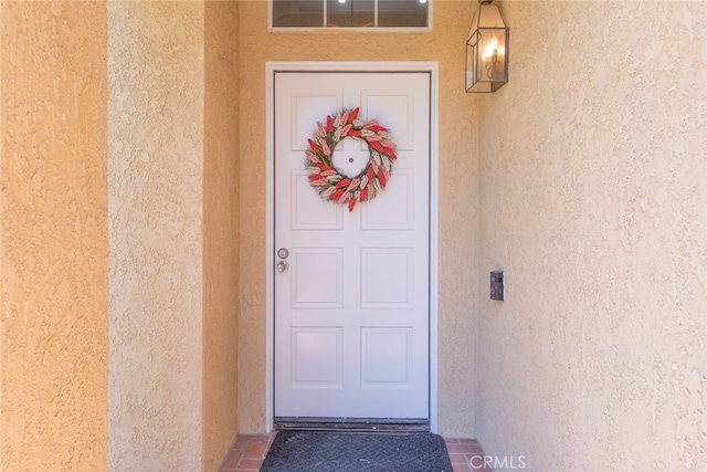 13100 Red Corral Dr, Corona, CA 92883 - doorway to property with stucco siding