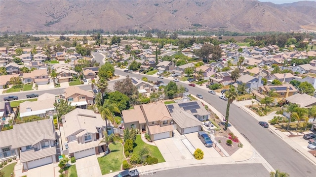 13100 Red Corral Dr, Corona, CA 92883 - aerial view of property and surrounding area featuring a mountainous background and nearby suburban area