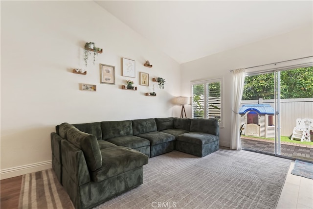 1103 Stone Pine Ln Unit C, Corona, CA 92879 - living room with lofted ceiling and baseboards