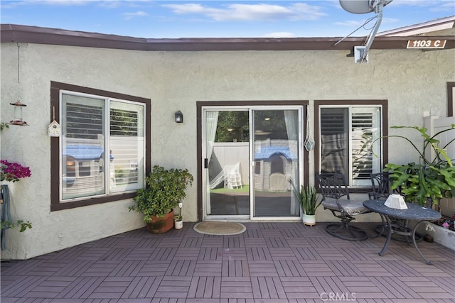 1103 Stone Pine Ln Unit C, Corona, CA 92879 - entrance to property featuring stucco siding and a patio area
