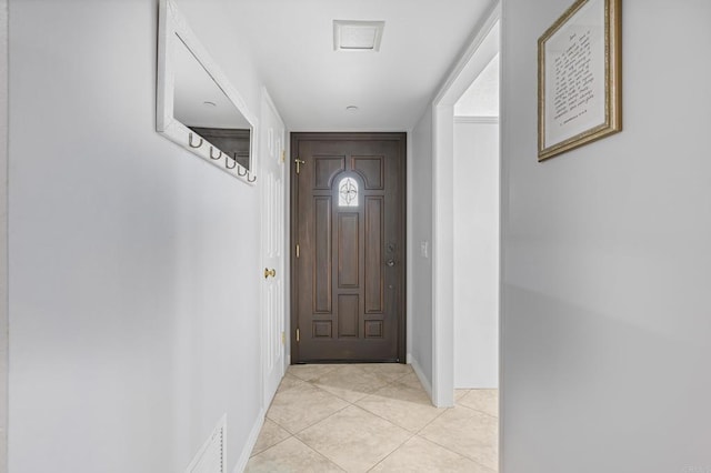 9915 Jacoby Rd, Spring Valley, CA 91977 - entryway featuring light tile patterned floors and baseboards
