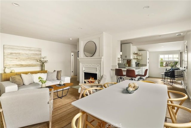 14519 Addison, Sherman Oaks, CA 91403 - living area featuring wood finished floors, a lit fireplace, and recessed lighting