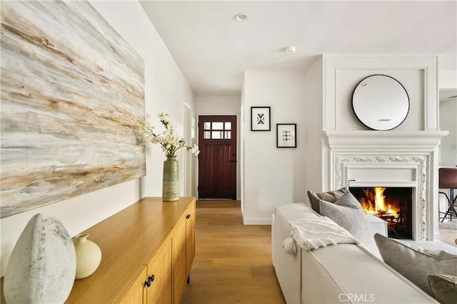 14519 Addison, Sherman Oaks, CA 91403 - entrance foyer with light wood finished floors and a warm lit fireplace