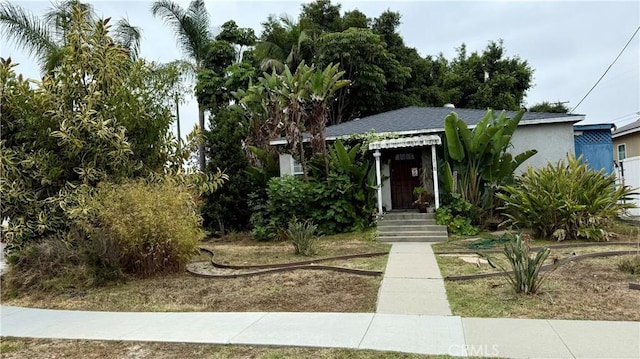 1518 E Luray St, Long Beach, CA 90807 - obstructed view of property with a shingled roof