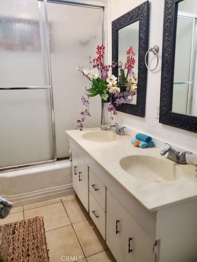 1518 E Luray St, Long Beach, CA 90807 - bathroom featuring double vanity, tile patterned flooring, and bath / shower combo with glass door
