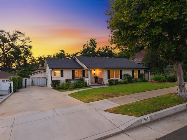 365 N Ivy Ave, Monrovia, CA 91016 - ranch-style home featuring a gate, an outdoor structure, concrete driveway, and board and batten siding