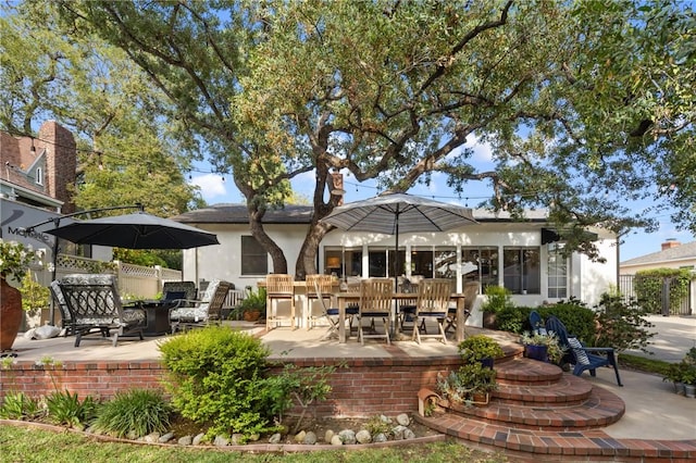 365 N Ivy Ave, Monrovia, CA 91016 - back of house featuring a patio area, stucco siding, and outdoor dining space