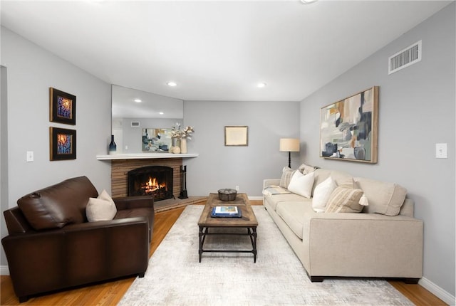 365 N Ivy Ave, Monrovia, CA 91016 - living area with wood finished floors, recessed lighting, and a fireplace