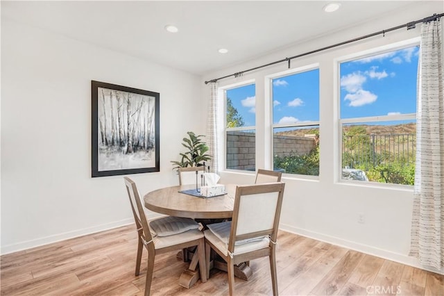 97 Eclipse, Lake Forest, CA 92630 - dining area with light wood-style floors and recessed lighting