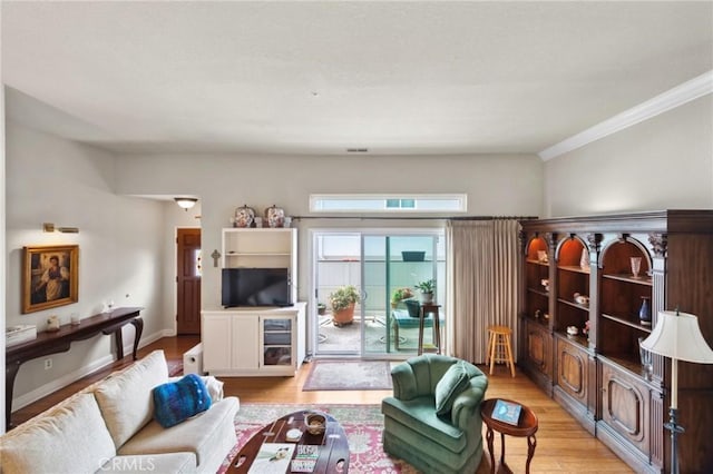 410 N Broadway Unit C, Redondo Beach, CA 90277 - living area featuring ornamental molding and light wood-style flooring