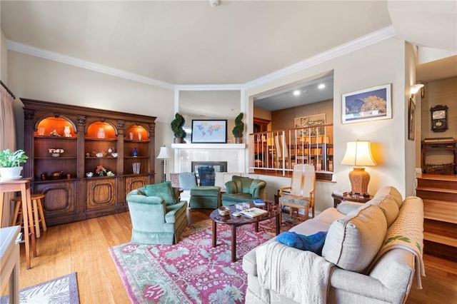 410 N Broadway Unit C, Redondo Beach, CA 90277 - living room with ornamental molding, wood finished floors, and a tile fireplace
