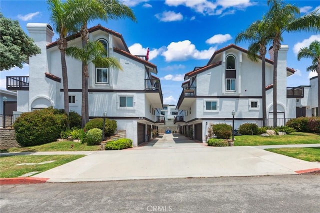 410 N Broadway Unit C, Redondo Beach, CA 90277 - view of building exterior featuring a garage and driveway