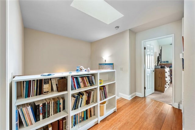 410 N Broadway Unit C, Redondo Beach, CA 90277 - sitting room featuring a skylight and hardwood / wood-style flooring