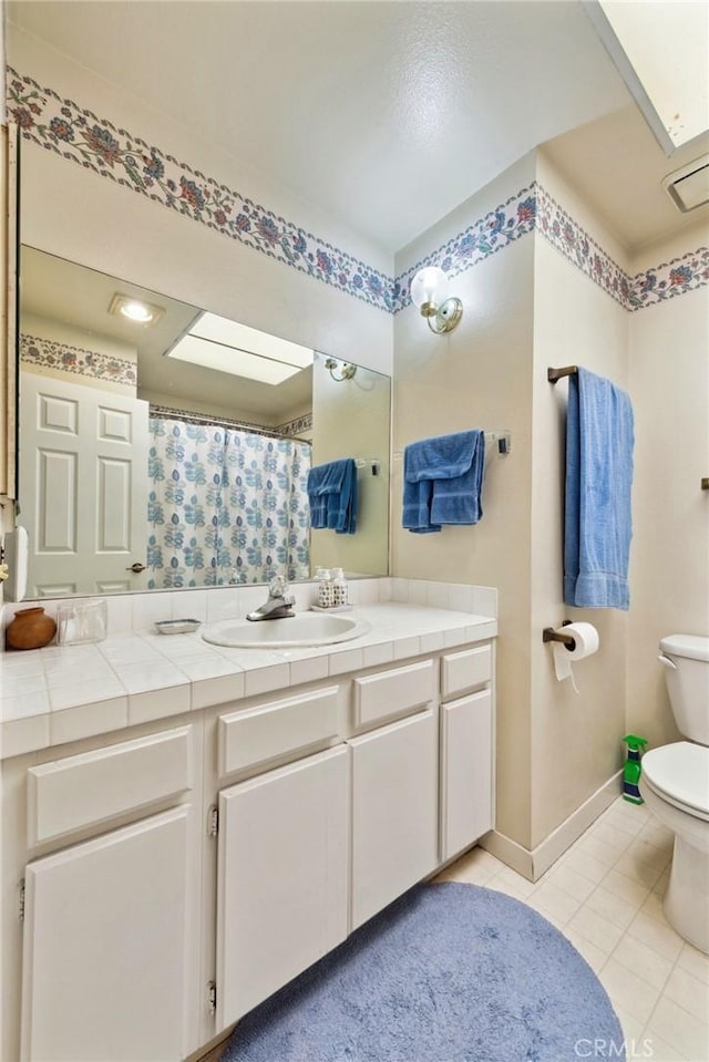 410 N Broadway Unit C, Redondo Beach, CA 90277 - full bathroom with vanity, tile patterned floors, and curtained shower